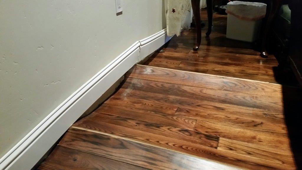 Assessing And Addressing Water Damage, Spilled Water On Engineered Hardwood Floor