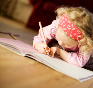 Small Child on Wood Floor