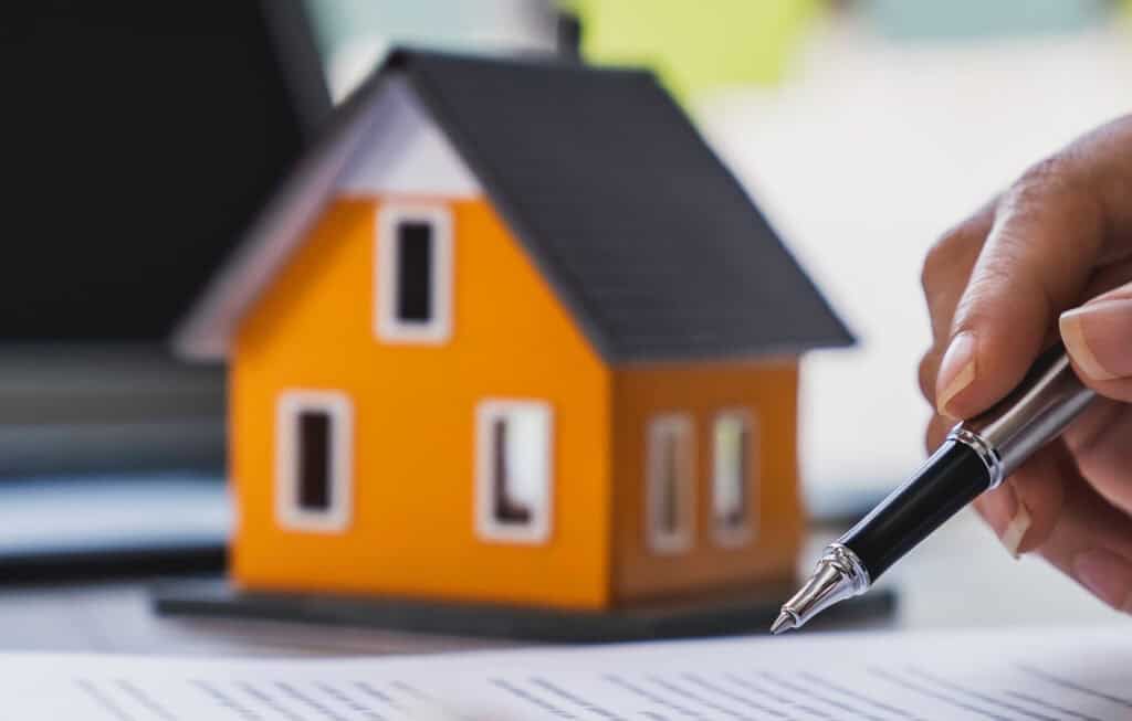 Image of Little House and Contract Signing